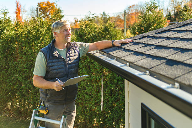 Professional Hail Damage Roof Repair technician working in Lagrange, WY